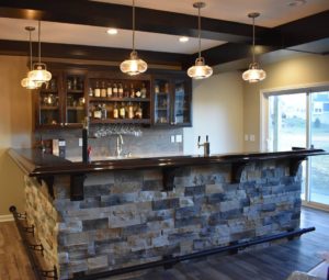 Basement wet bar with custom bar top.